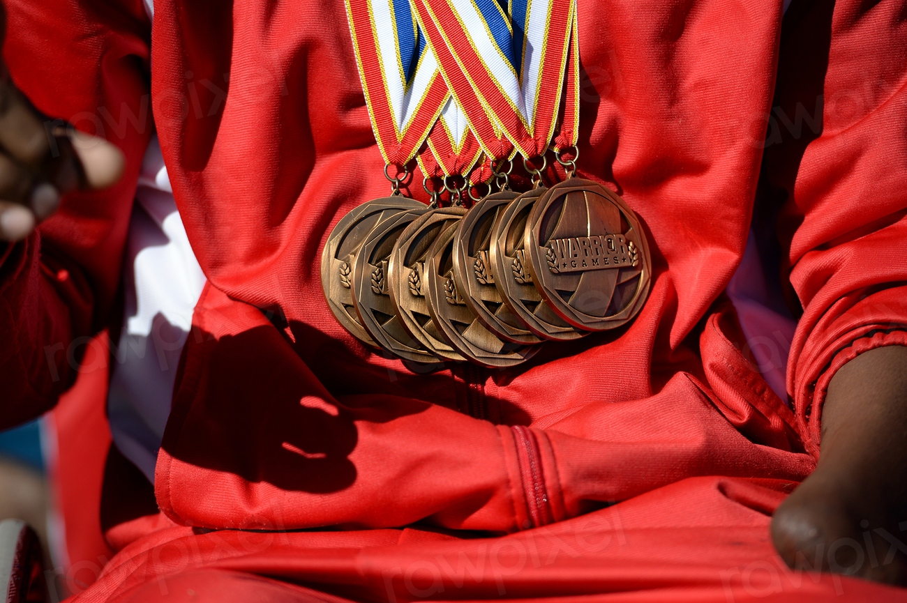 Gold medals shine on the chest