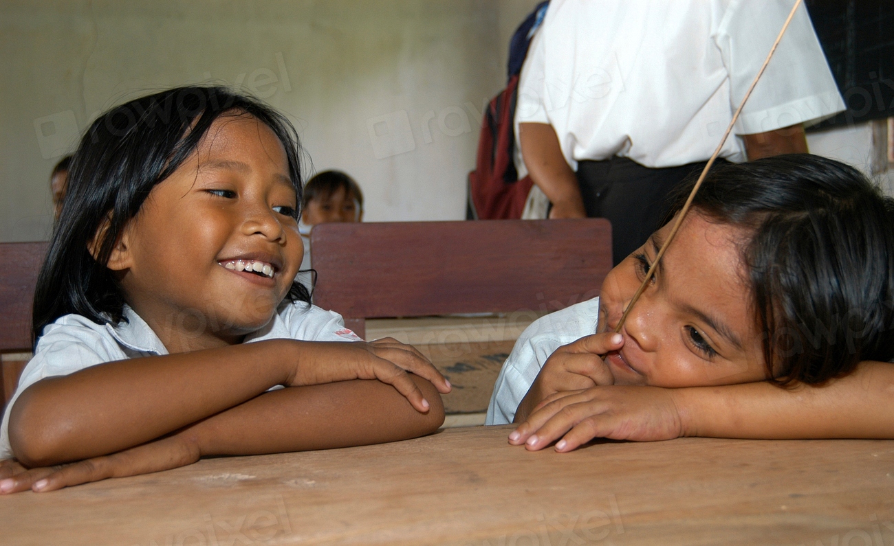 Enthusiastic children in class. Photo