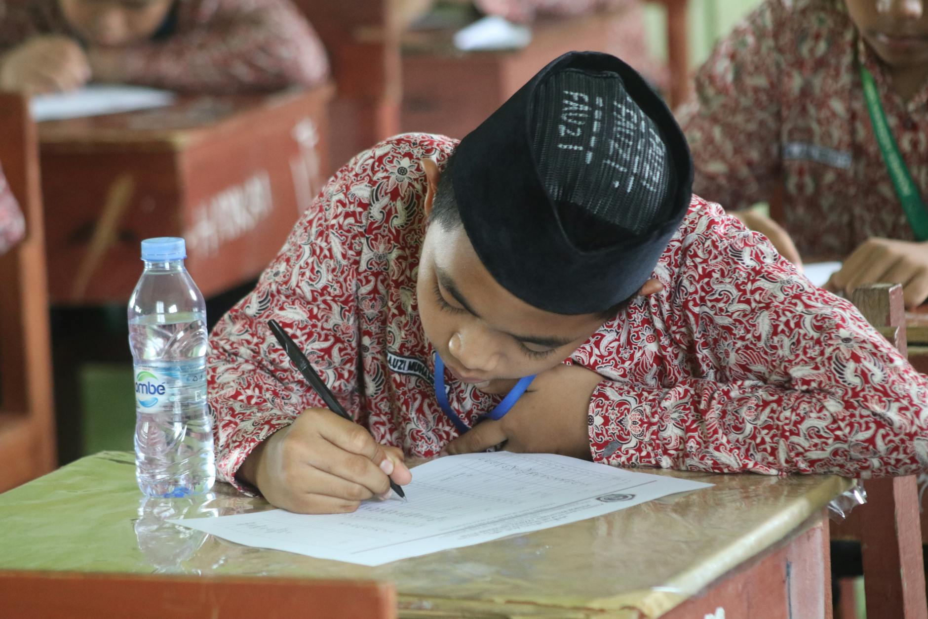 a boy taking a test at school