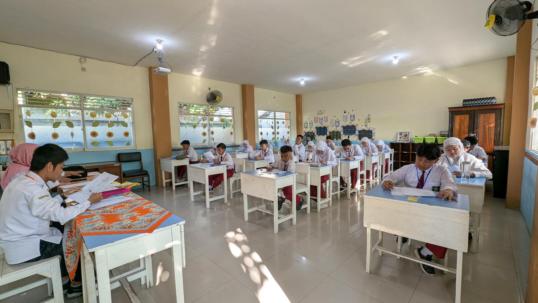 indonesian students in classroom exam setting