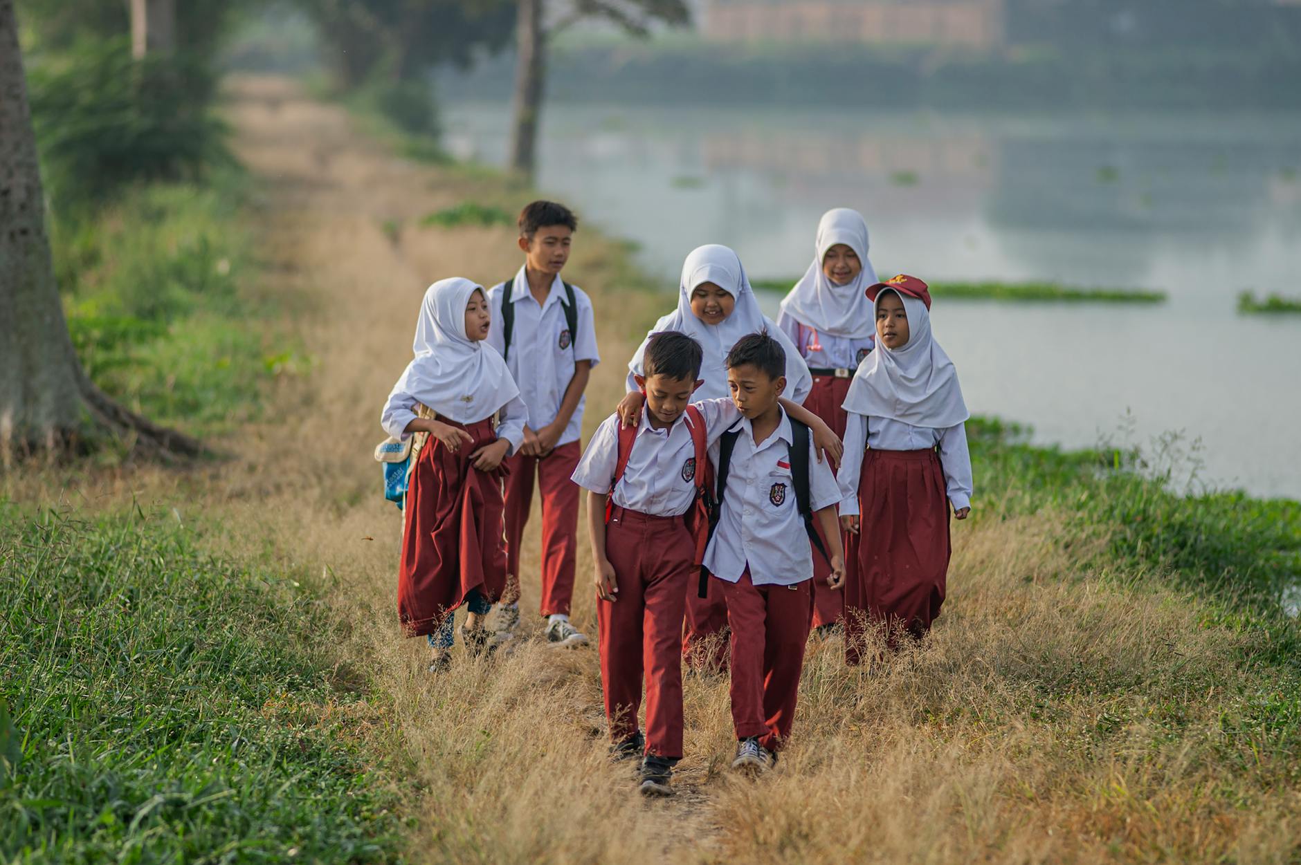 indonesian school children walking after class