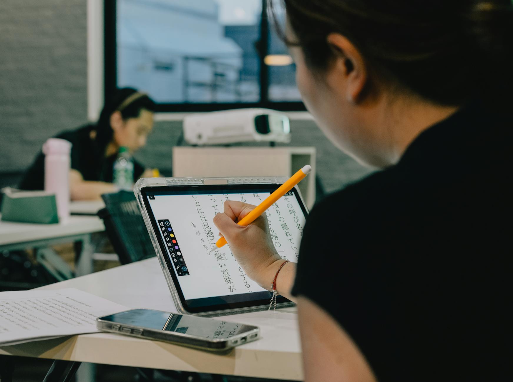 japanese classroom with students using technology